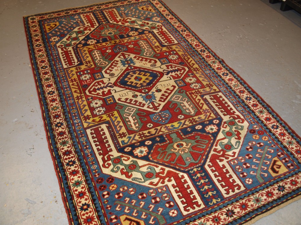ANTIQUE CAUCASIAN KASIM-USAG RUG, CLASSIC DESIGN WITH SUPERB COLOUR, DATED, 1893. View XVII