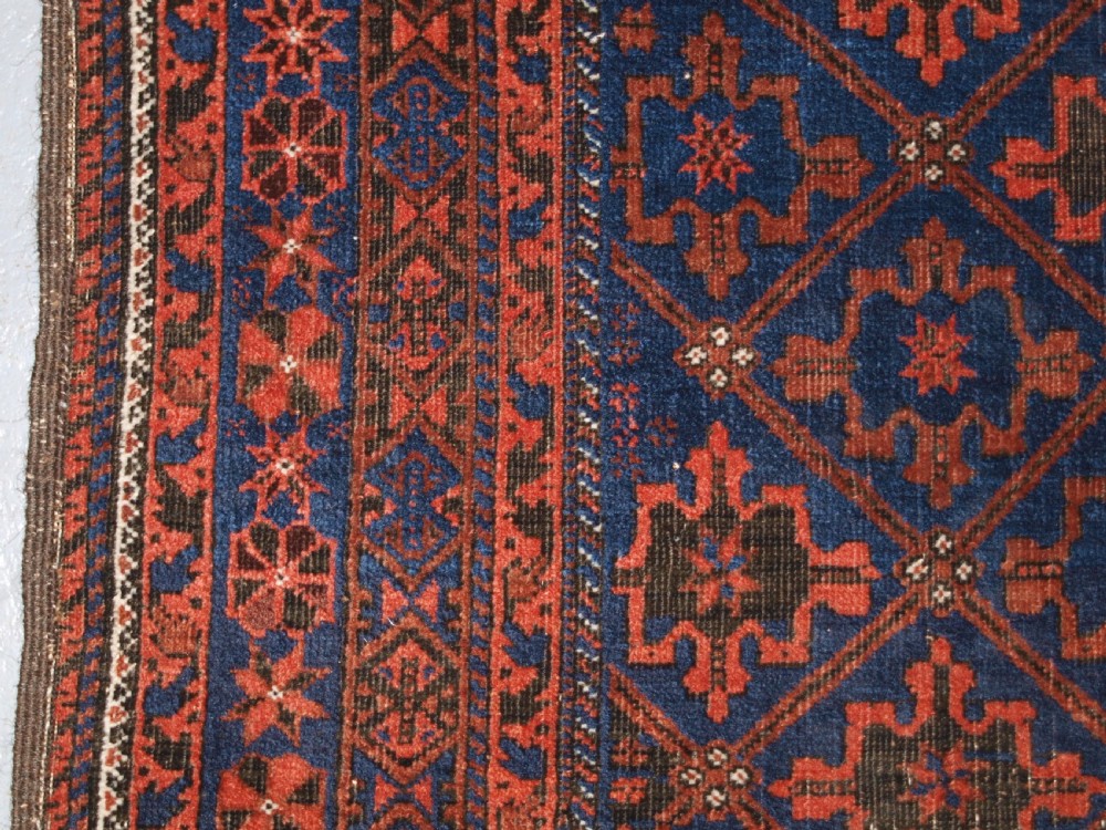 ANTIQUE BALUCH RUG, KHORASSAN REGION, NORTH EAST PERSIA, SNOWFLAKE DESIGN, CIRCA 1880. View III