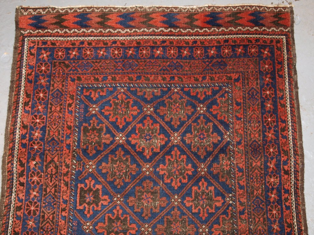 ANTIQUE BALUCH RUG, KHORASSAN REGION, NORTH EAST PERSIA, SNOWFLAKE DESIGN, CIRCA 1880. View IV