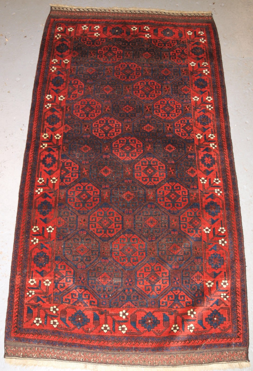 ANTIQUE BALUCH RUG WITH OUTSTANDING COLOUR, FULL PILE, GREAT BORDER, CIRCA 1880.