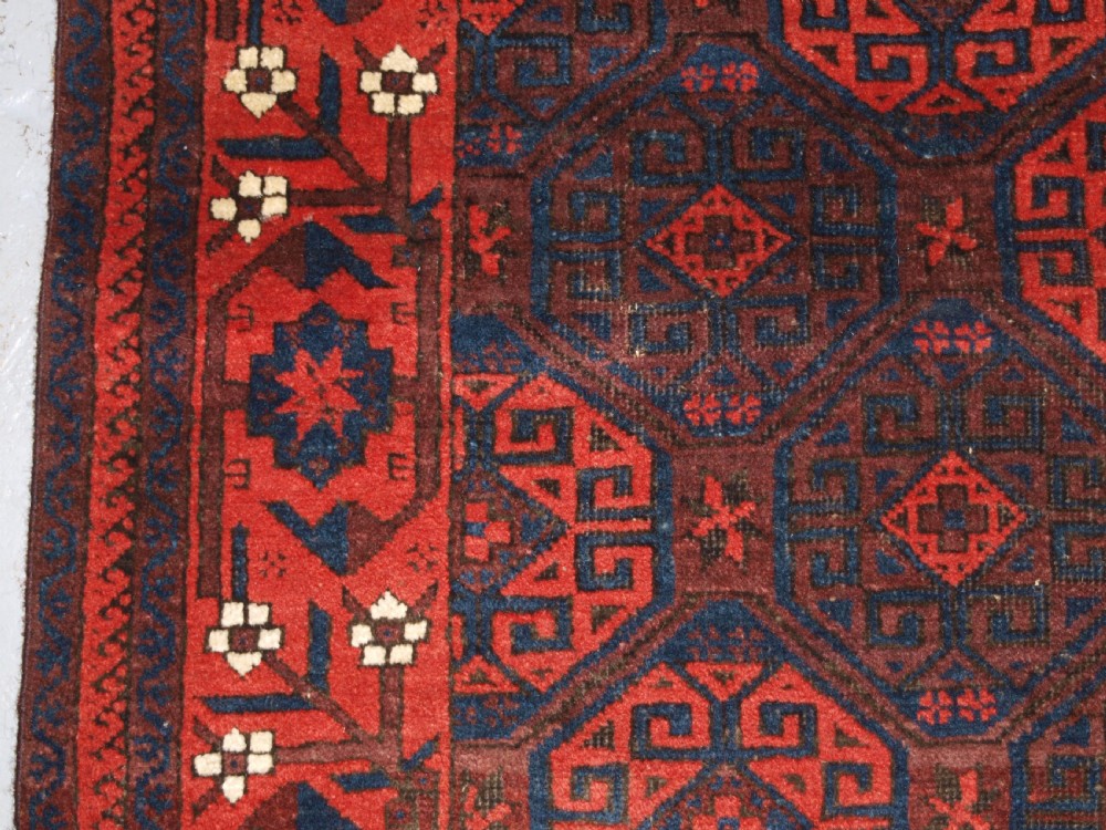 ANTIQUE BALUCH RUG WITH OUTSTANDING COLOUR, FULL PILE, GREAT BORDER, CIRCA 1880. View IV