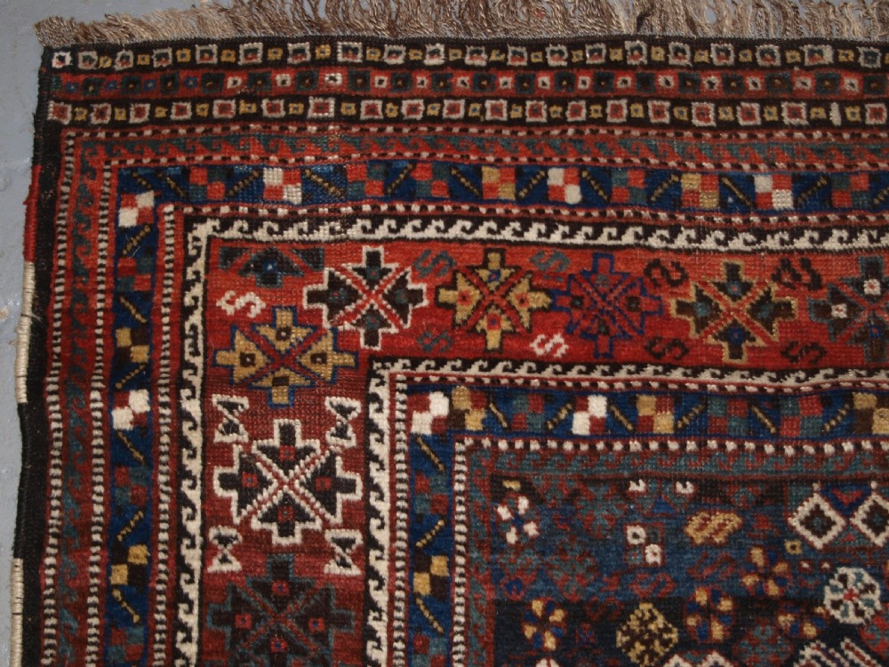ANTIQUE SOUTH WEST PERSIAN TRIBAL KHAMSEH RUG, TRIPLE MEDALLION, CIRCA 1900. View II