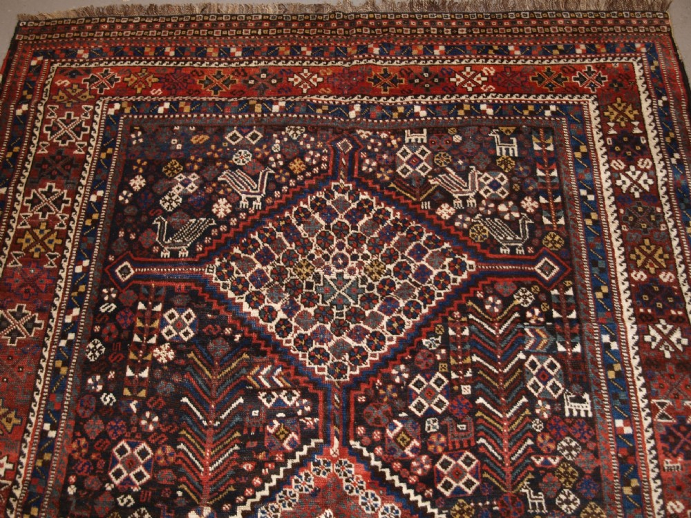 ANTIQUE SOUTH WEST PERSIAN TRIBAL KHAMSEH RUG, TRIPLE MEDALLION, CIRCA 1900. View IV