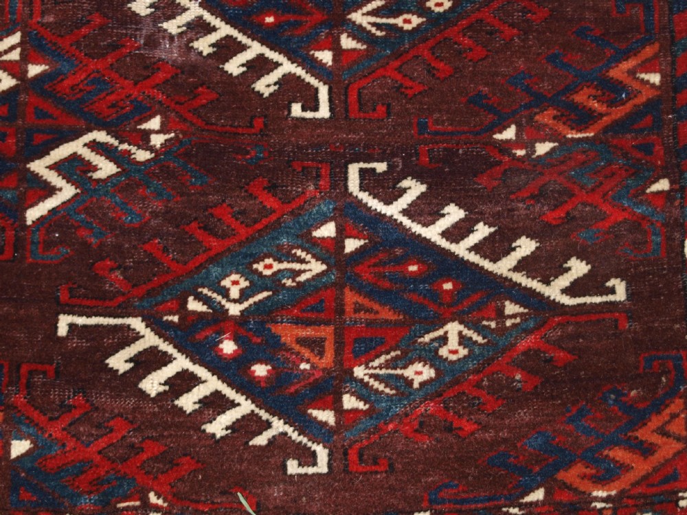 ANTIQUE YOMUT TURKMEN MAIN CARPET WITH DYRNAK GUL DESIGN, CURL LEAF BORDER, CIRCA 1880. View XIII