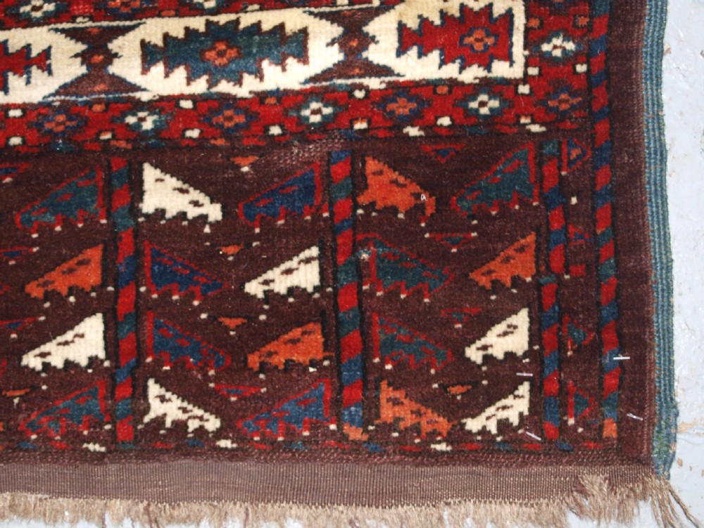 ANTIQUE YOMUT TURKMEN MAIN CARPET WITH DYRNAK GUL DESIGN, CURL LEAF BORDER, CIRCA 1880. View XIV