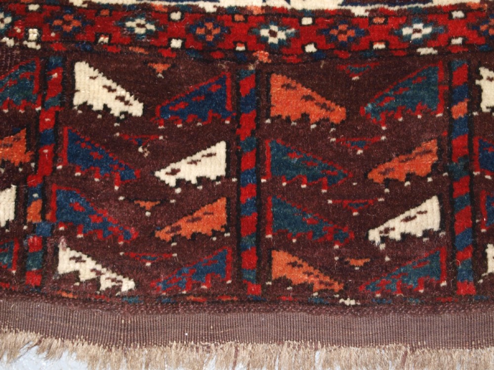 ANTIQUE YOMUT TURKMEN MAIN CARPET WITH DYRNAK GUL DESIGN, CURL LEAF BORDER, CIRCA 1880. View XV