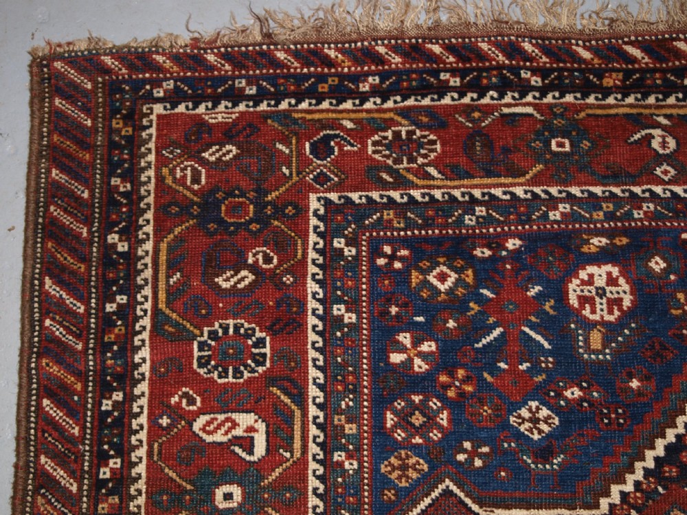 ANTIQUE TRIBAL KHAMSEH RUG, TRIPLE LINKED MEDALLION, CIRCA 1900. View II