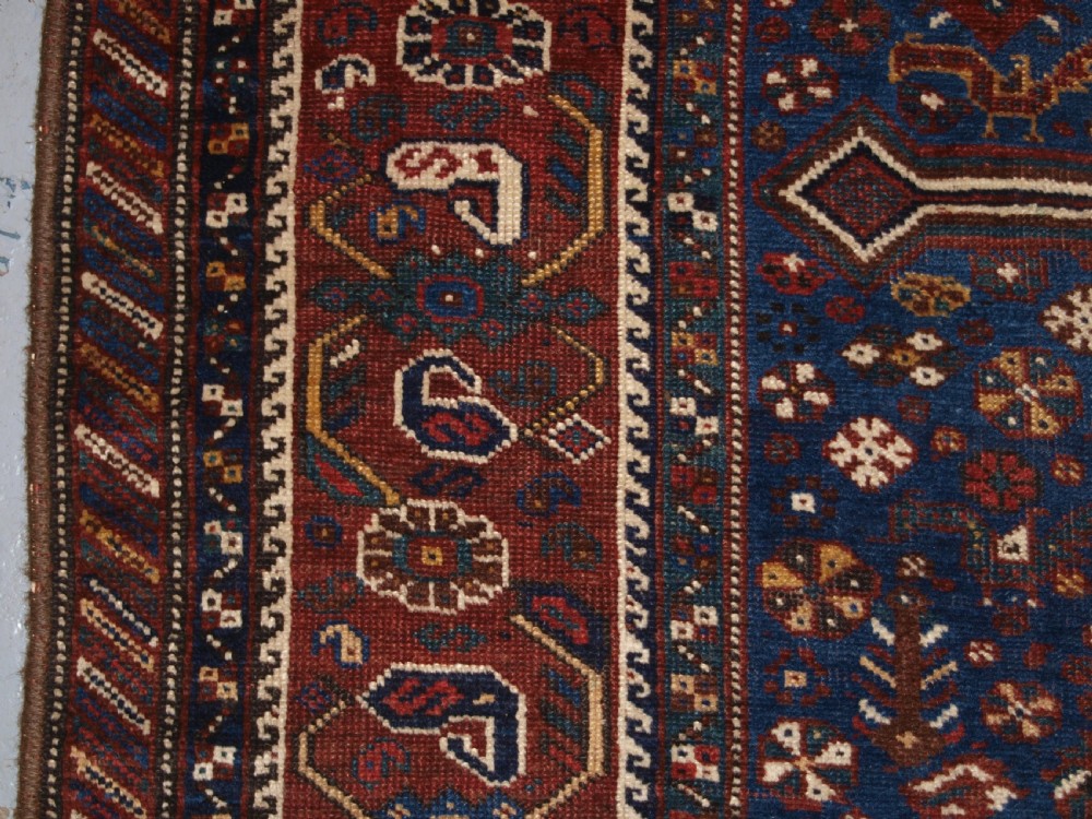 ANTIQUE TRIBAL KHAMSEH RUG, TRIPLE LINKED MEDALLION, CIRCA 1900. View III