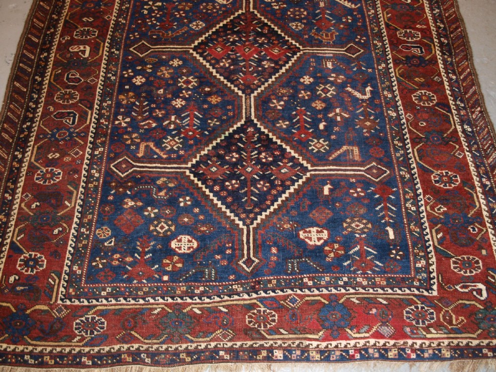 ANTIQUE TRIBAL KHAMSEH RUG, TRIPLE LINKED MEDALLION, CIRCA 1900. View VI