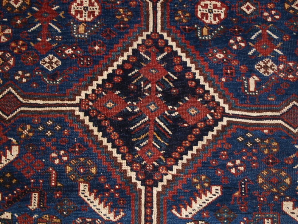 ANTIQUE TRIBAL KHAMSEH RUG, TRIPLE LINKED MEDALLION, CIRCA 1900. View VII