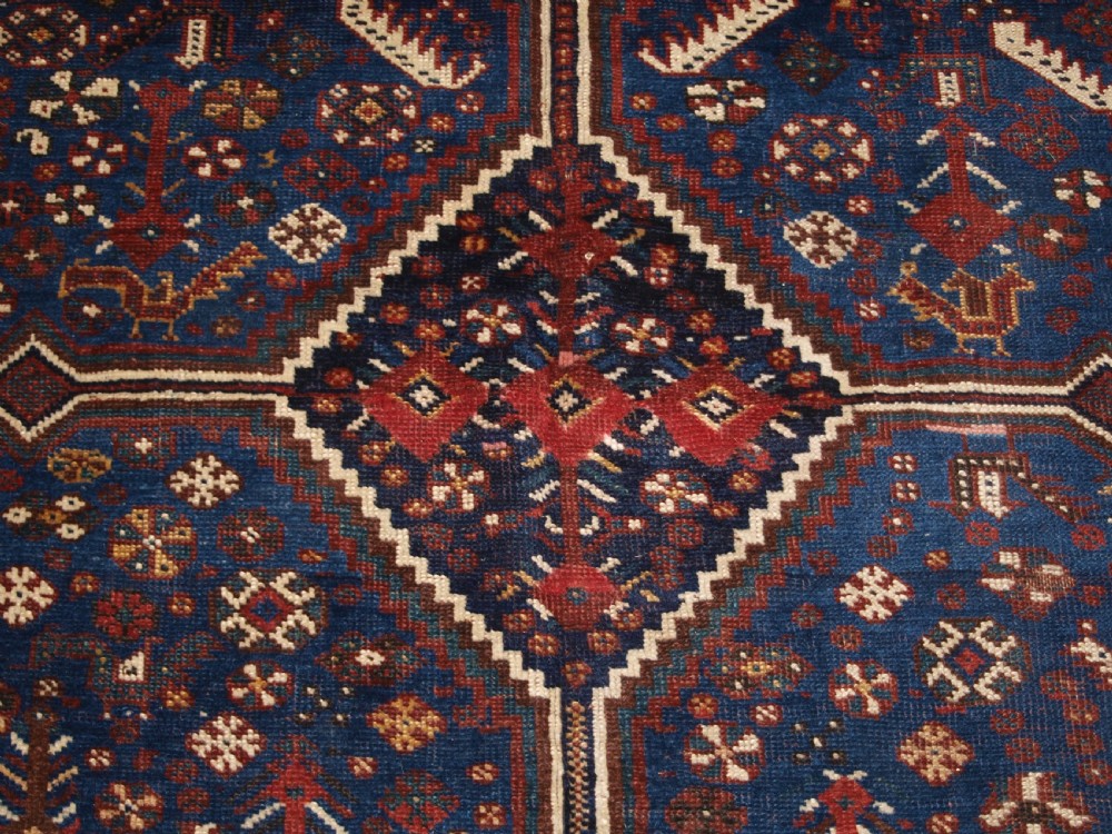 ANTIQUE TRIBAL KHAMSEH RUG, TRIPLE LINKED MEDALLION, CIRCA 1900. View VIII