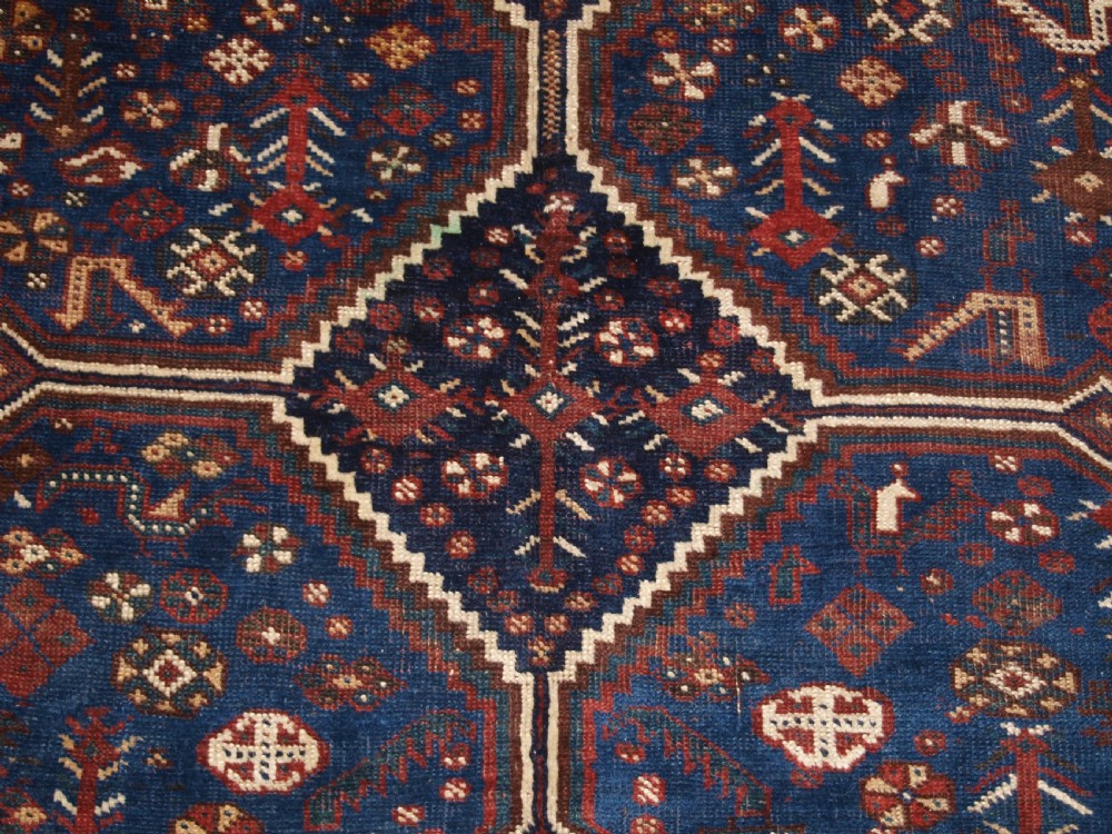ANTIQUE TRIBAL KHAMSEH RUG, TRIPLE LINKED MEDALLION, CIRCA 1900. View IX