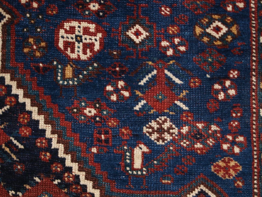 ANTIQUE TRIBAL KHAMSEH RUG, TRIPLE LINKED MEDALLION, CIRCA 1900. View X