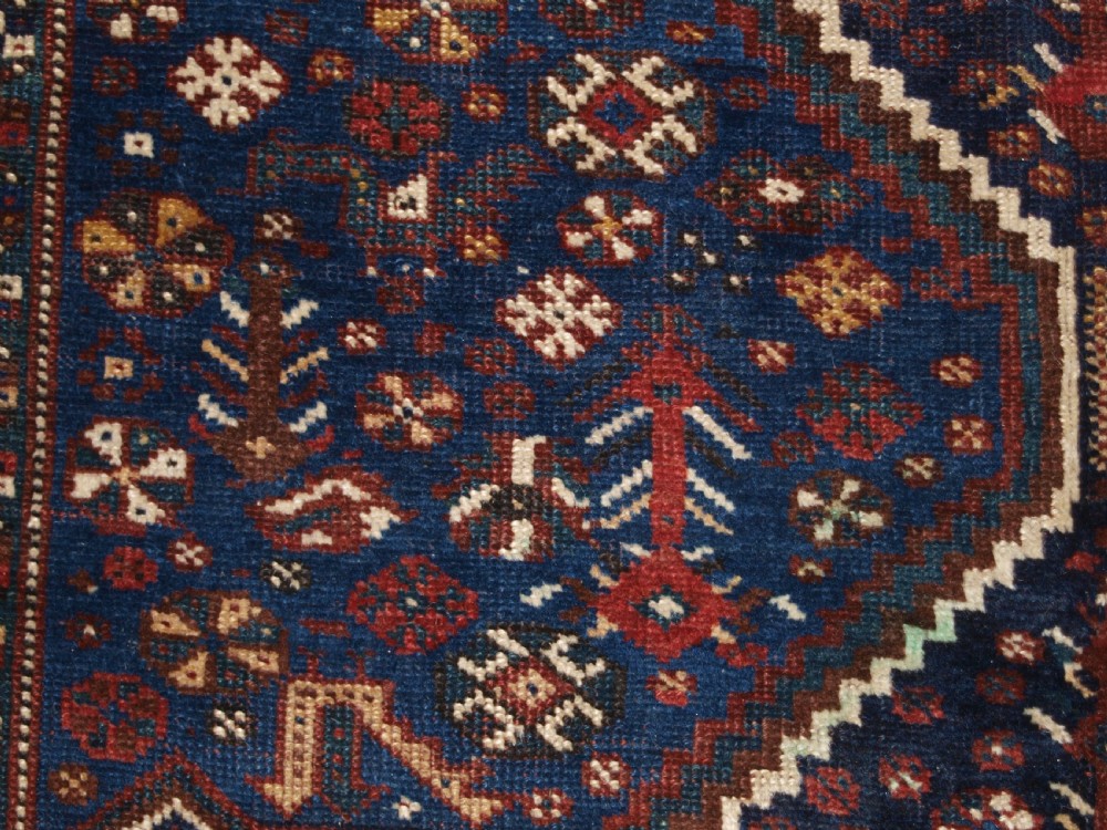 ANTIQUE TRIBAL KHAMSEH RUG, TRIPLE LINKED MEDALLION, CIRCA 1900. View XI