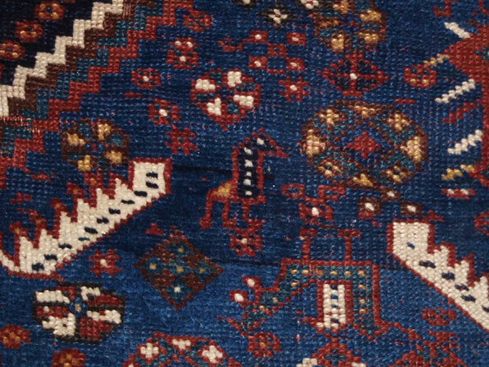 ANTIQUE TRIBAL KHAMSEH RUG, TRIPLE LINKED MEDALLION, CIRCA 1900. View XII
