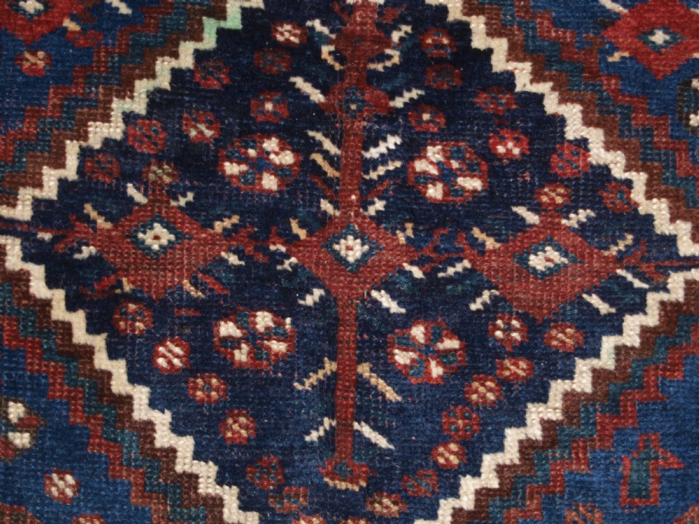 ANTIQUE TRIBAL KHAMSEH RUG, TRIPLE LINKED MEDALLION, CIRCA 1900. View XIII