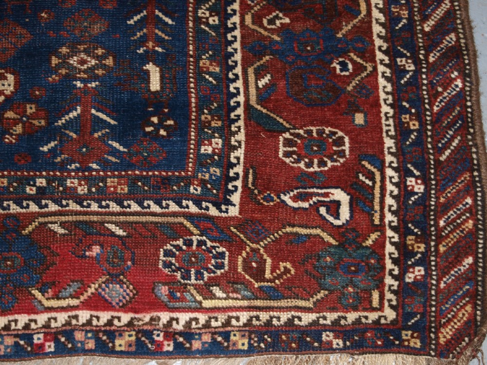 ANTIQUE TRIBAL KHAMSEH RUG, TRIPLE LINKED MEDALLION, CIRCA 1900. View XV