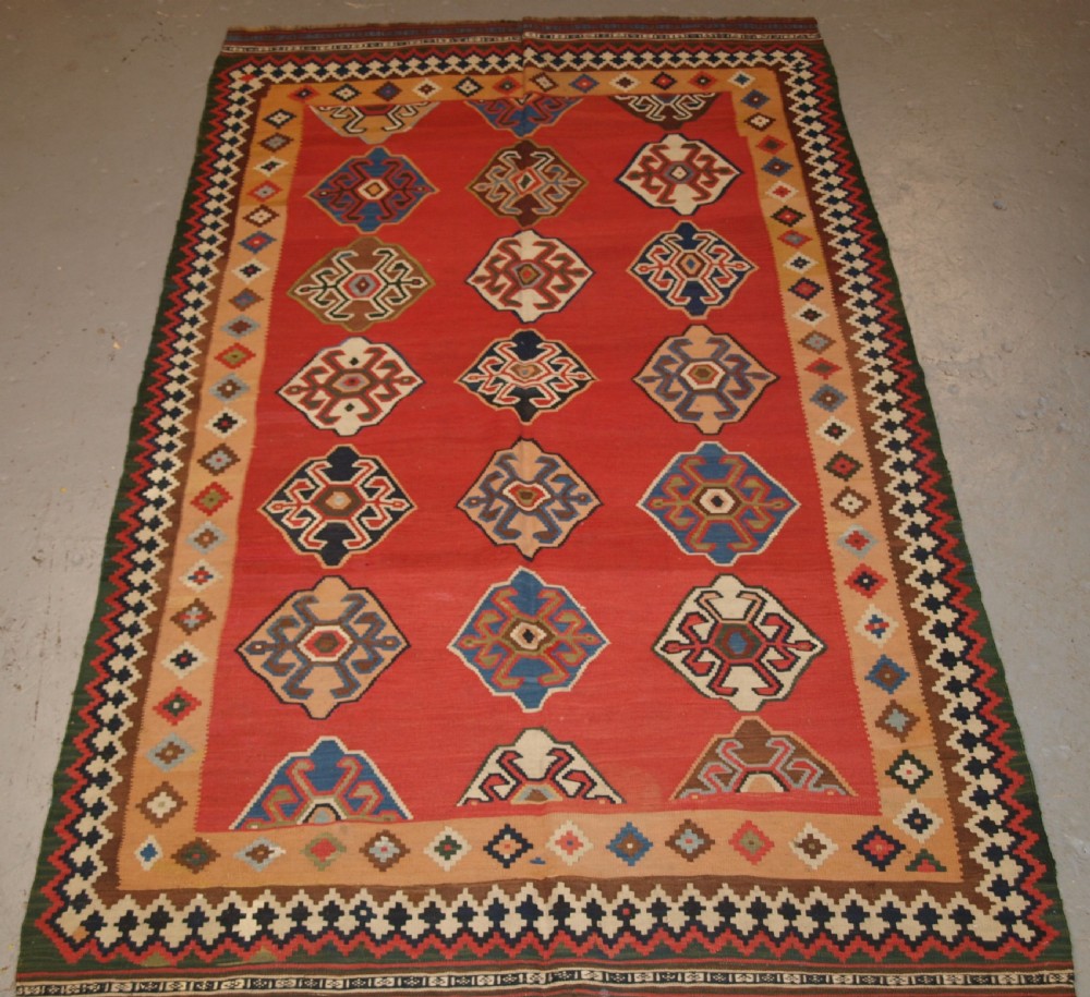 ANTIQUE SOUTH WEST PERSIAN QASHQAI KILIM WITH SUPERB COLOUR AND DESIGN, CIRCA 1900.
