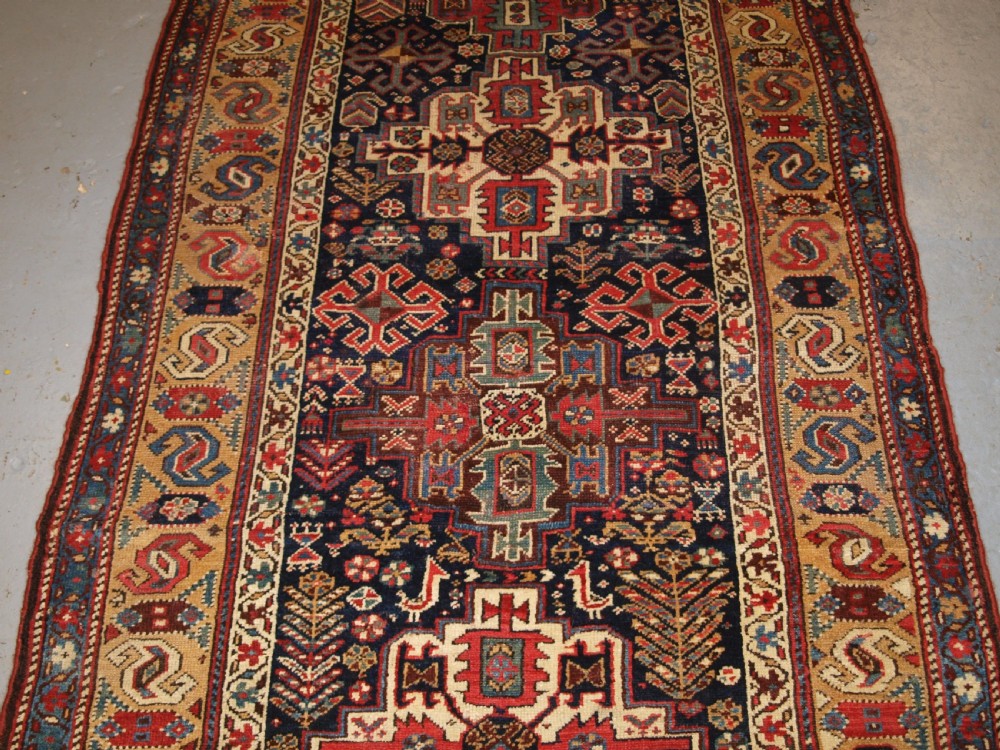 ANTIQUE KURDISH LONG RUG WITH MEDALLION DESIGN, SUPERB COLOUR, CIRCA 1880. View IV