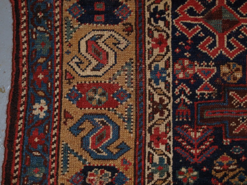 ANTIQUE KURDISH LONG RUG WITH MEDALLION DESIGN, SUPERB COLOUR, CIRCA 1880. View V