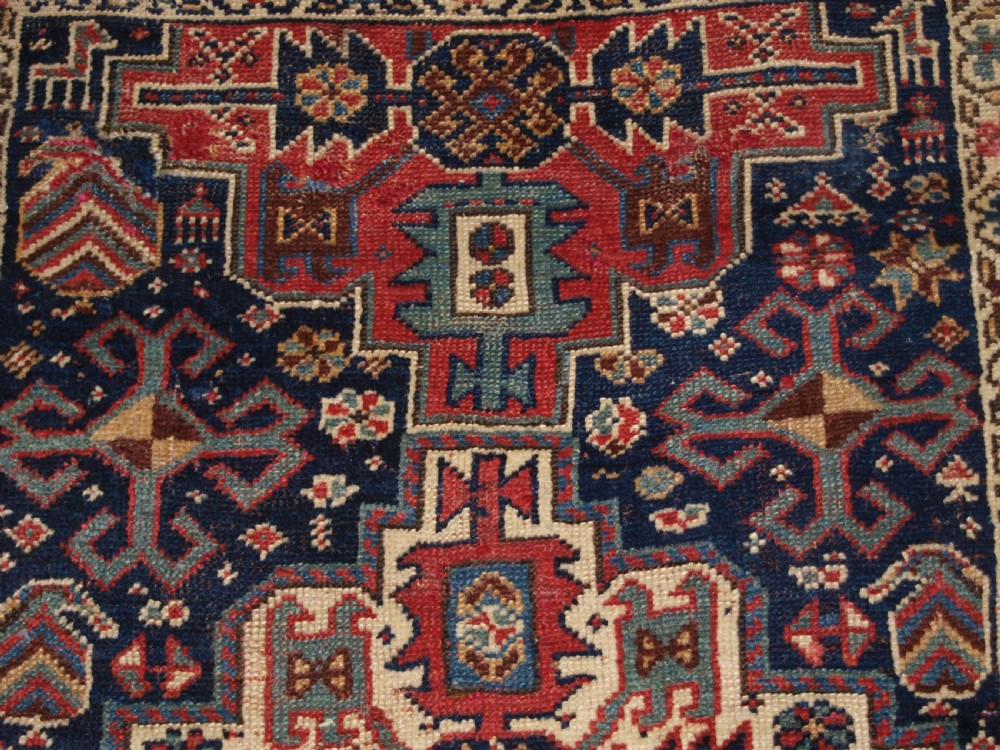 ANTIQUE KURDISH LONG RUG WITH MEDALLION DESIGN, SUPERB COLOUR, CIRCA 1880. View VIII