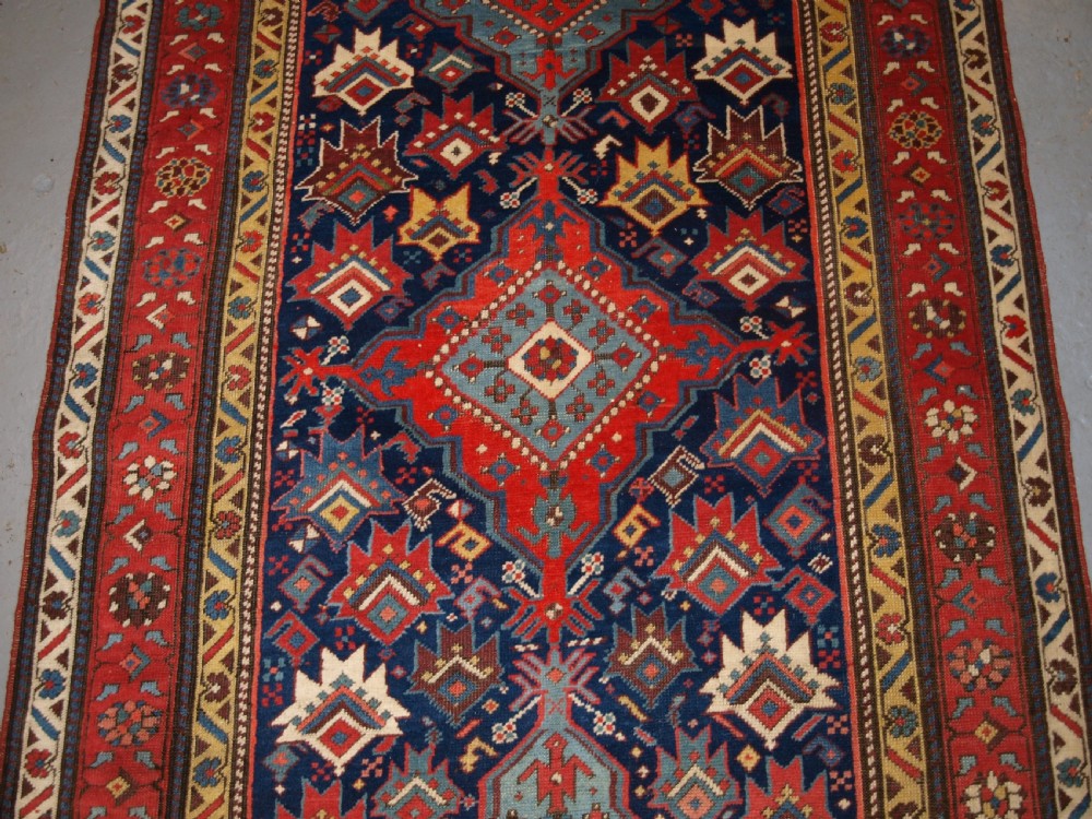 ANTIQUE SOUTH CAUCASIAN RUNNER WITH OUTSTANDING COLOUR AND DESIGN, LATE 19TH CENTURY. View III
