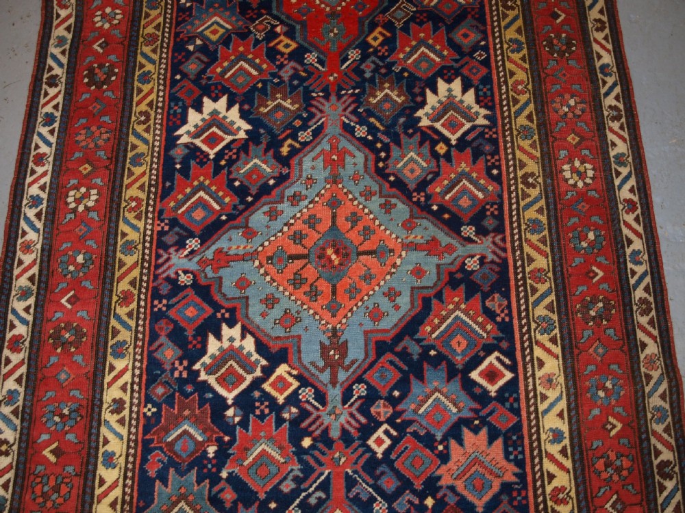 ANTIQUE SOUTH CAUCASIAN RUNNER WITH OUTSTANDING COLOUR AND DESIGN, LATE 19TH CENTURY. View IV