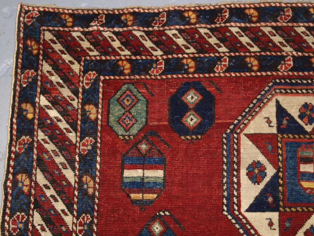 ANTIQUE CAUCASIAN SHIRVAN RUG WITH UNUSUAL STAR DESIGN, LATE 19TH CENTURY. View II