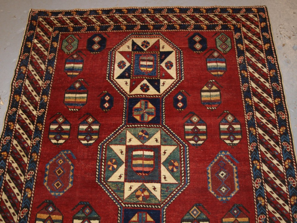 ANTIQUE CAUCASIAN SHIRVAN RUG WITH UNUSUAL STAR DESIGN, LATE 19TH CENTURY. View III