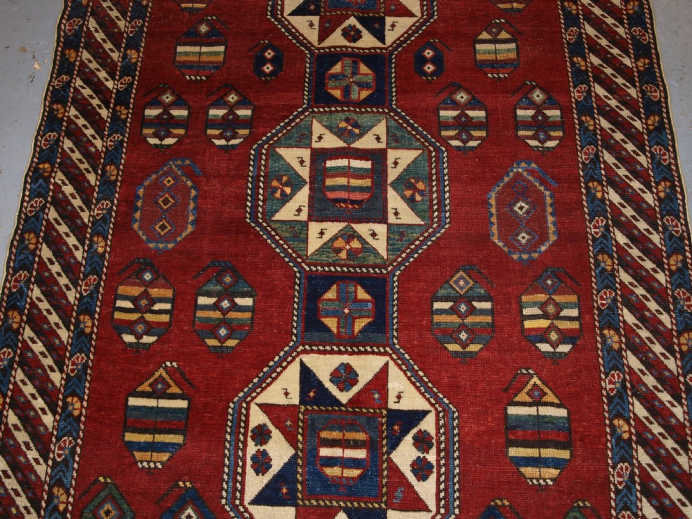 ANTIQUE CAUCASIAN SHIRVAN RUG WITH UNUSUAL STAR DESIGN, LATE 19TH CENTURY. View IV