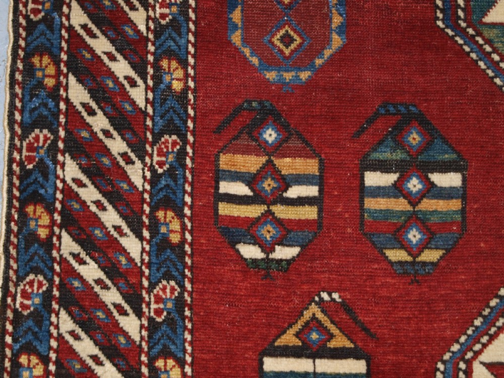ANTIQUE CAUCASIAN SHIRVAN RUG WITH UNUSUAL STAR DESIGN, LATE 19TH CENTURY. View VI
