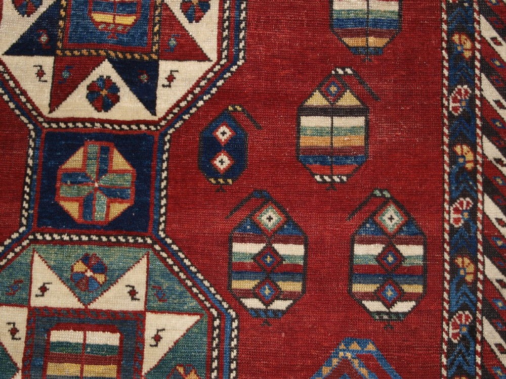 ANTIQUE CAUCASIAN SHIRVAN RUG WITH UNUSUAL STAR DESIGN, LATE 19TH CENTURY. View IX
