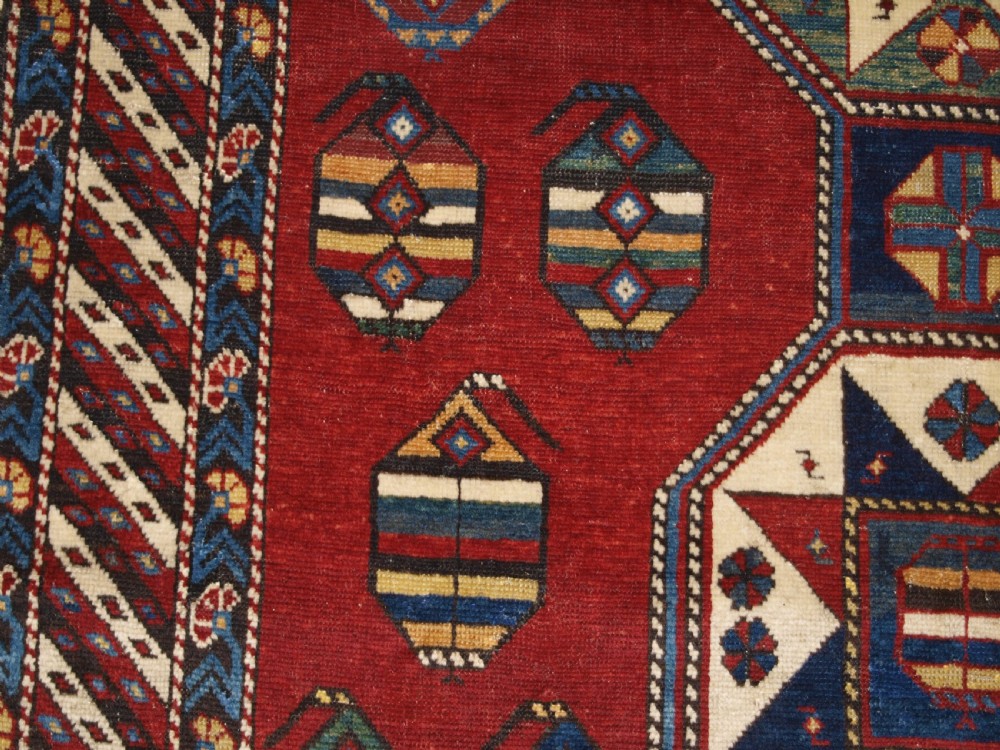 ANTIQUE CAUCASIAN SHIRVAN RUG WITH UNUSUAL STAR DESIGN, LATE 19TH CENTURY. View XI