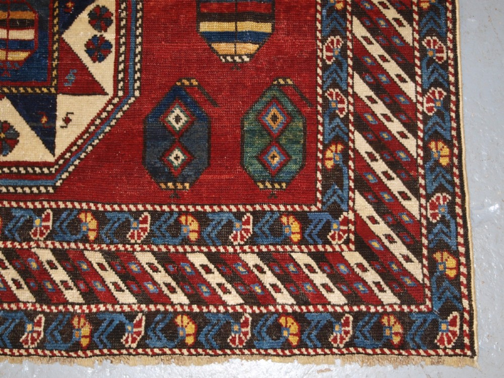 ANTIQUE CAUCASIAN SHIRVAN RUG WITH UNUSUAL STAR DESIGN, LATE 19TH CENTURY. View XIII