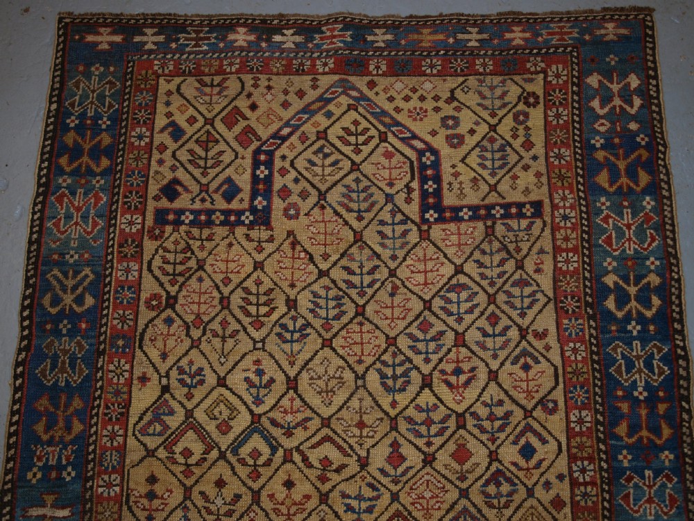 ANTIQUE CAUCASIAN DAGESTAN PRAYER RUG, YELLOW GROUND LATTICE DESIGN, 2ND HALF 19TH CENTURY. View IV