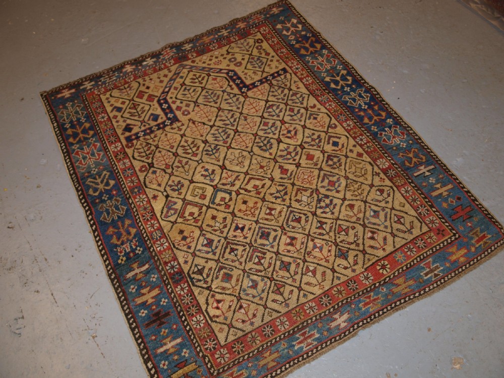ANTIQUE CAUCASIAN DAGESTAN PRAYER RUG, YELLOW GROUND LATTICE DESIGN, 2ND HALF 19TH CENTURY. View XIV