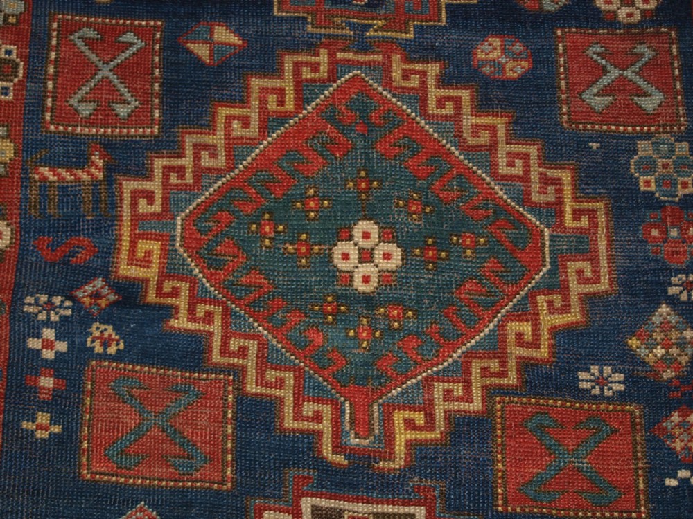 ANTIQUE CAUCASIAN KAZAK RUG, FIVE MEDALLION DESIGN, GREAT COLOURS, CIRCA 1880. View X