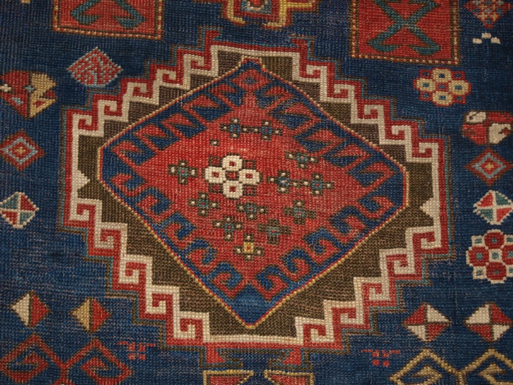 ANTIQUE CAUCASIAN KAZAK RUG, FIVE MEDALLION DESIGN, GREAT COLOURS, CIRCA 1880. View XI