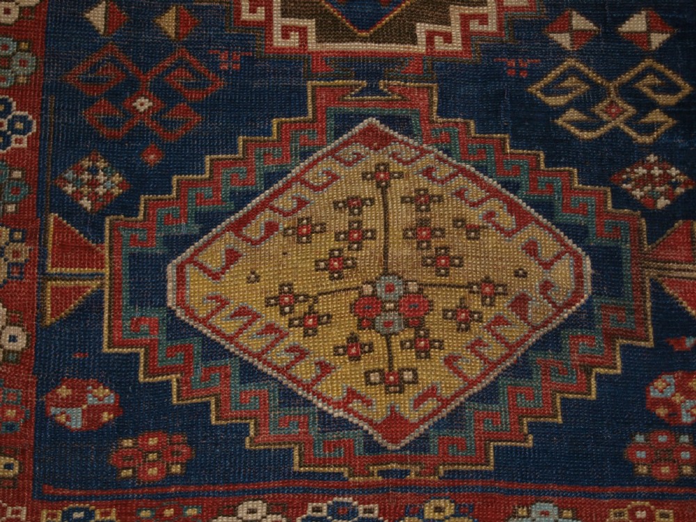 ANTIQUE CAUCASIAN KAZAK RUG, FIVE MEDALLION DESIGN, GREAT COLOURS, CIRCA 1880. View XII