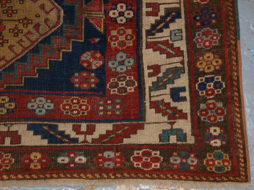 ANTIQUE CAUCASIAN KAZAK RUG, FIVE MEDALLION DESIGN, GREAT COLOURS, CIRCA 1880. View XIII