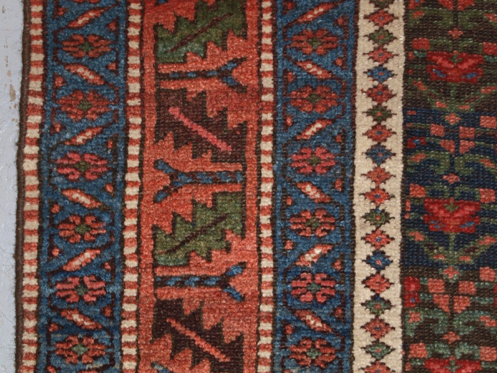 ANTIQUE KURDISH LONG RUG WITH ALL OVER SHRUB DESIGN, LATE 19TH CENTURY. View III