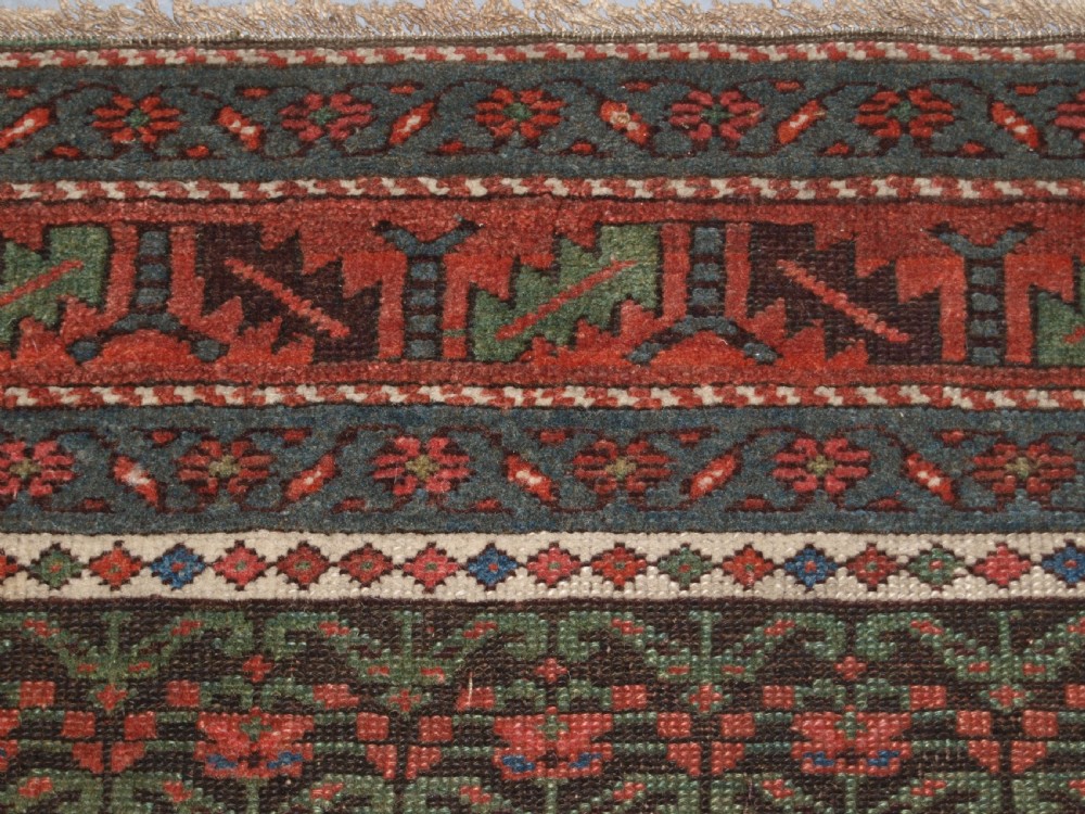 ANTIQUE KURDISH LONG RUG WITH ALL OVER SHRUB DESIGN, LATE 19TH CENTURY. View VII