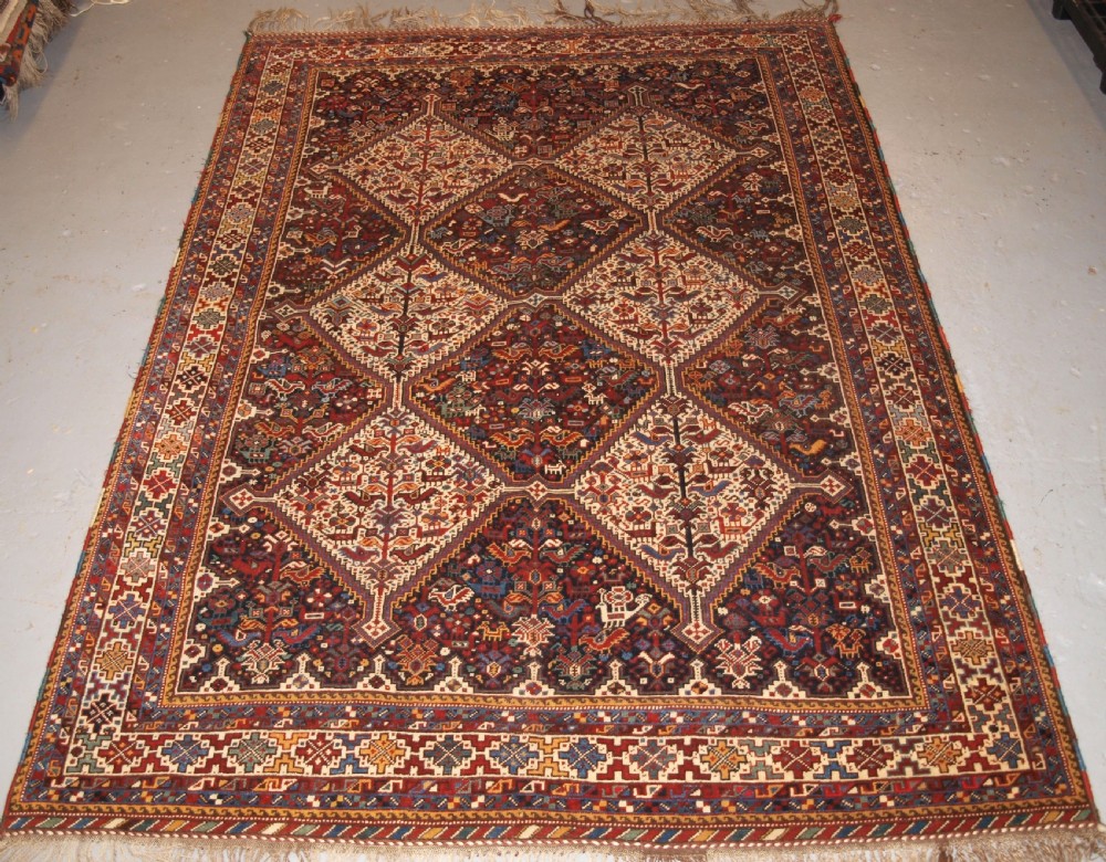 ANTIQUE KHAMSEH BIRD RUG, SUPERB EXAMPLE, CIRCA 1900.