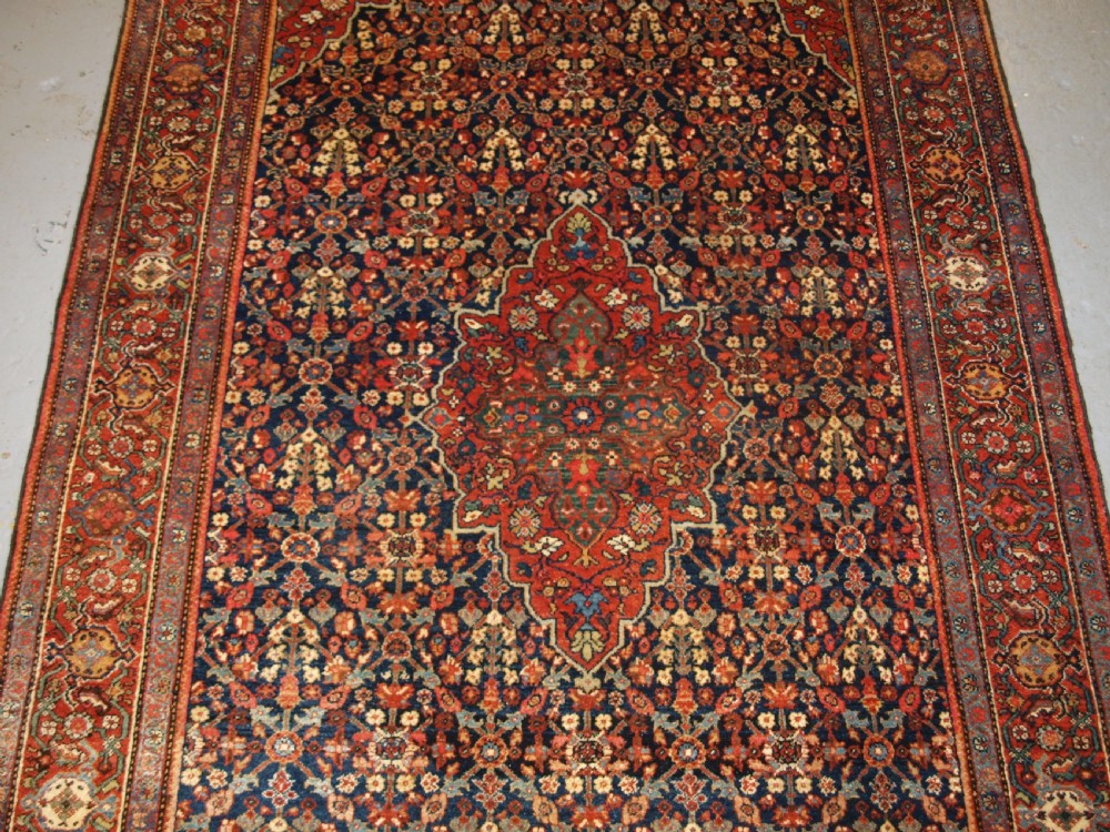 ANTIQUE PERSIAN FARAGHAN RUG WITH SHRUB DESIGN, FULL PILE WITH GREAT COLOUR. CIRCA 1900. View V