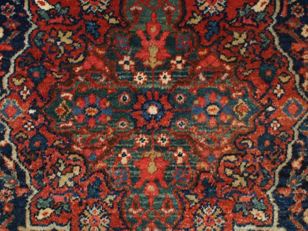 ANTIQUE PERSIAN FARAGHAN RUG WITH SHRUB DESIGN, FULL PILE WITH GREAT COLOUR. CIRCA 1900. View X