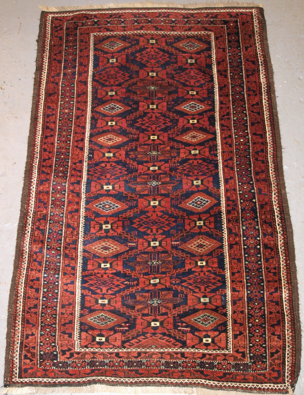 ANTIQUE BALUCH RUG, KHORASAN REGION, ALL OVER DESIGN, CIRCA 1900.