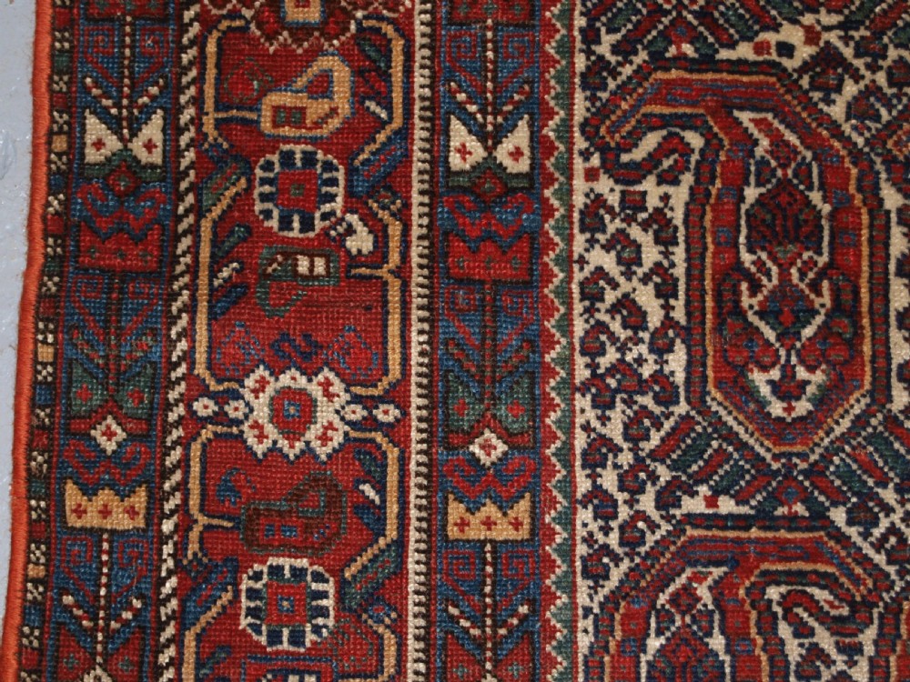 ANTIQUE KHAMSEH RUG WITH REPEAT BOTEH DESIGN, CIRCA 1900. View III