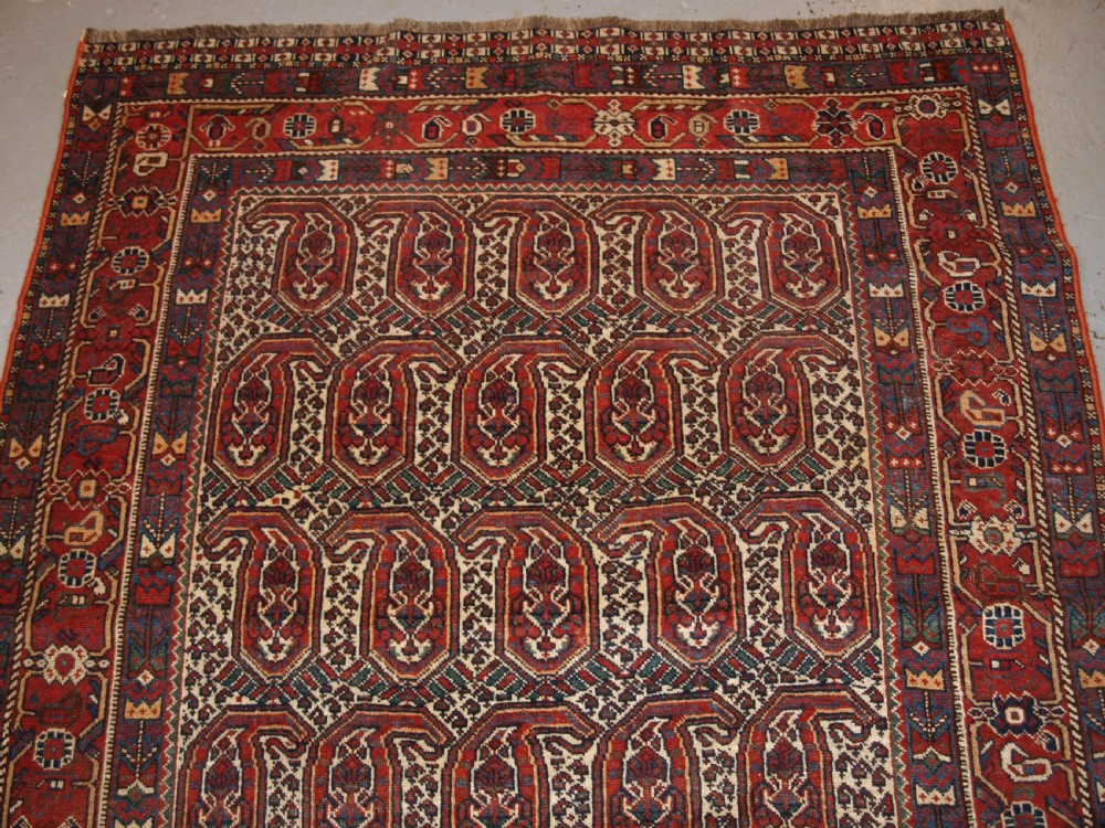 ANTIQUE KHAMSEH RUG WITH REPEAT BOTEH DESIGN, CIRCA 1900. View IV