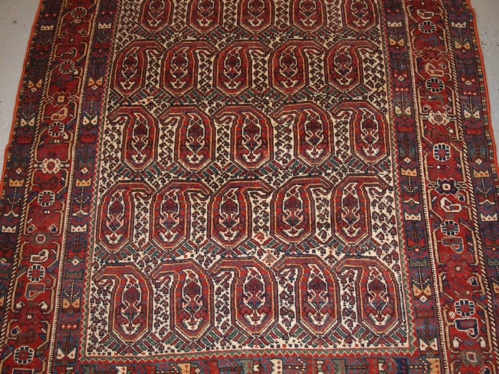 ANTIQUE KHAMSEH RUG WITH REPEAT BOTEH DESIGN, CIRCA 1900. View V