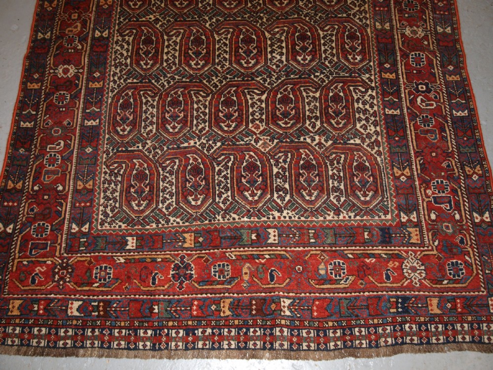 ANTIQUE KHAMSEH RUG WITH REPEAT BOTEH DESIGN, CIRCA 1900. View VI
